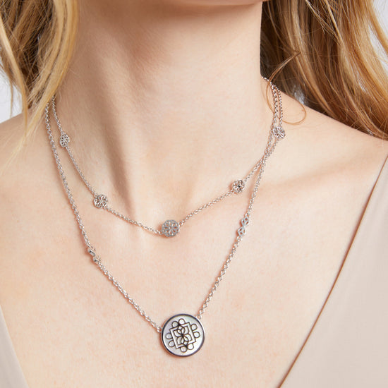 Silver Lanna Signature Necklace with intricate medallion pendant on a delicate chain